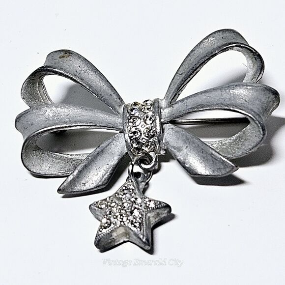Vtg JJ Jonette Ribbon Bow Brooch Heart Dangle Pewter Silver Tone Rhinestones - Picture 1 of 11